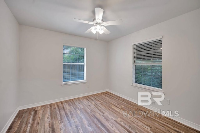31246 Shambo Rd, Spanish Fort, AL 36527 - spare room with wood finished floors and ceiling fan