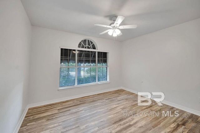 31246 Shambo Rd, Spanish Fort, AL 36527 - unfurnished room featuring wood finished floors and a ceiling fan