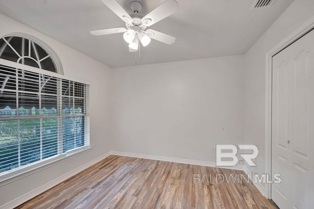 31246 Shambo Rd, Spanish Fort, AL 36527 - empty room with wood finished floors and a ceiling fan