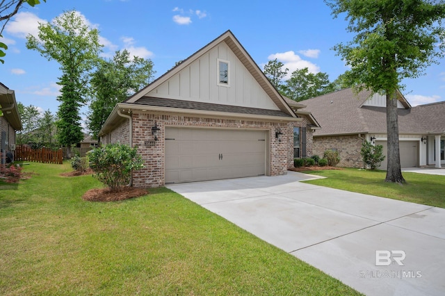 craftsman-style house featuring a front lawn, brick siding, a garage, board and batten siding, and driveway