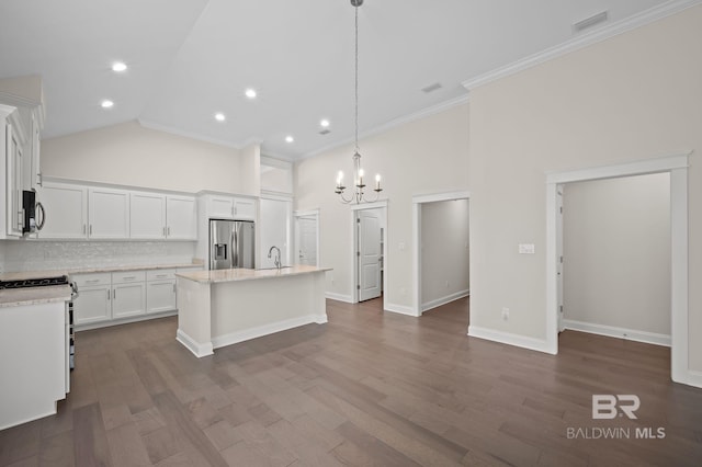 kitchen featuring stainless steel refrigerator with ice dispenser, tasteful backsplash, high vaulted ceiling, white cabinets, and an inviting chandelier