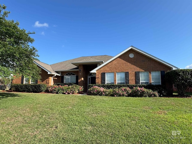 11554 Braga Dr, Daphne, AL 36526 - ranch-style home featuring brick siding and a front lawn