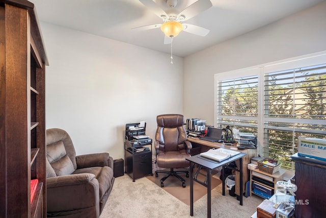 office featuring light colored carpet and ceiling fan