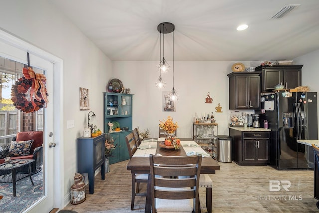 dining area featuring light hardwood / wood-style flooring