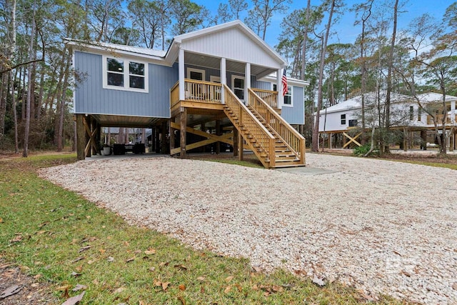 view of front facade featuring a carport and covered porch