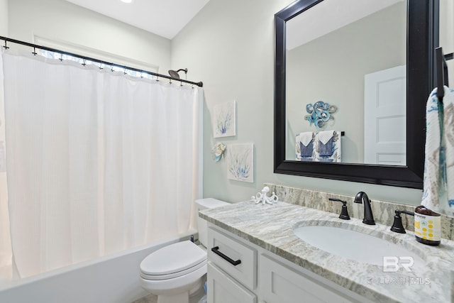 full bathroom featuring vanity, toilet, and shower / bathtub combination with curtain