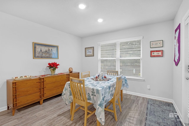 dining area featuring hardwood / wood-style floors