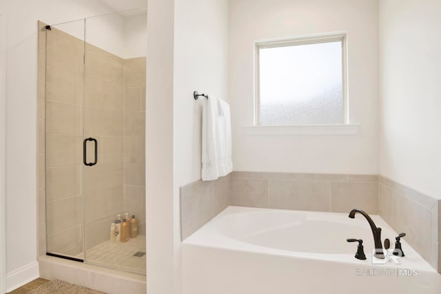 22258 Hibiscus Cir, Foley, AL 36535 - bathroom with a stall shower and a bath