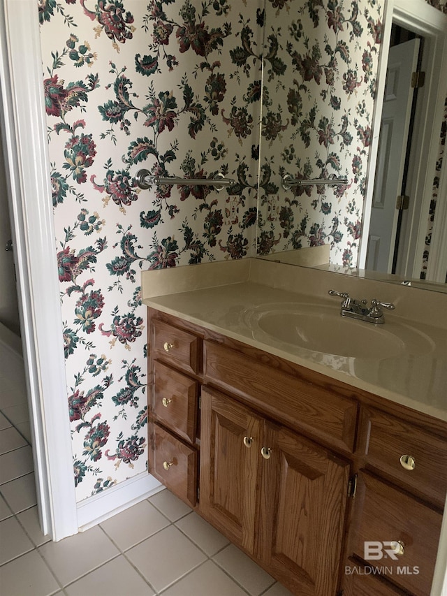 bathroom featuring vanity and tile patterned flooring