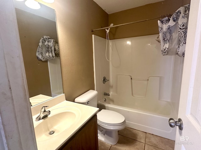 full bath featuring toilet, shower / bath combination, tile patterned flooring, and vanity