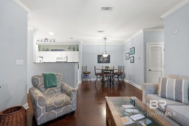 450 Park Ave Unit 112, Foley, AL 36535 - living room featuring dark wood-type flooring, baseboards, and ornamental molding