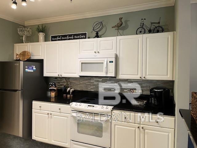 450 Park Ave Unit 112, Foley, AL 36535 - kitchen with white appliances, decorative backsplash, ornamental molding, white cabinetry, and dark countertops