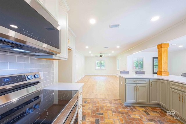 362 Azalea St, Fairhope, AL 36532 - kitchen featuring stainless steel appliances, light countertops, tasteful backsplash, a ceiling fan, and recessed lighting