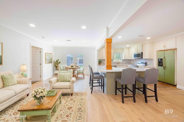 362 Azalea St, Fairhope, AL 36532 - living area with ornamental molding, light wood-style floors, recessed lighting, and baseboards