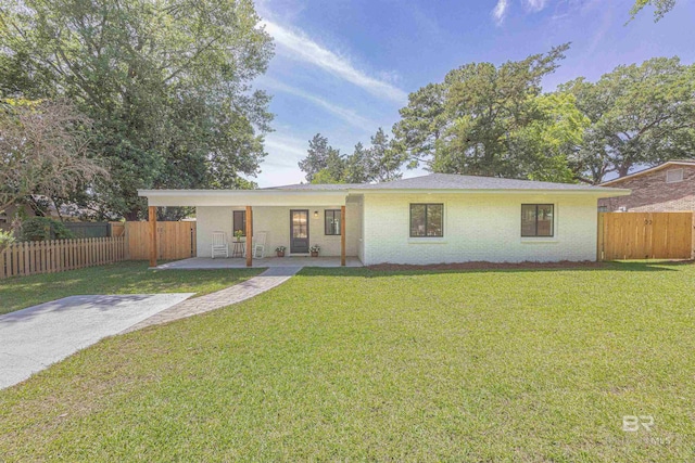 362 Azalea St, Fairhope, AL 36532 - ranch-style house with a patio area