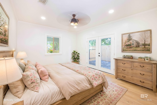 362 Azalea St, Fairhope, AL 36532 - bedroom featuring access to exterior, french doors, crown molding, light wood finished floors, and recessed lighting