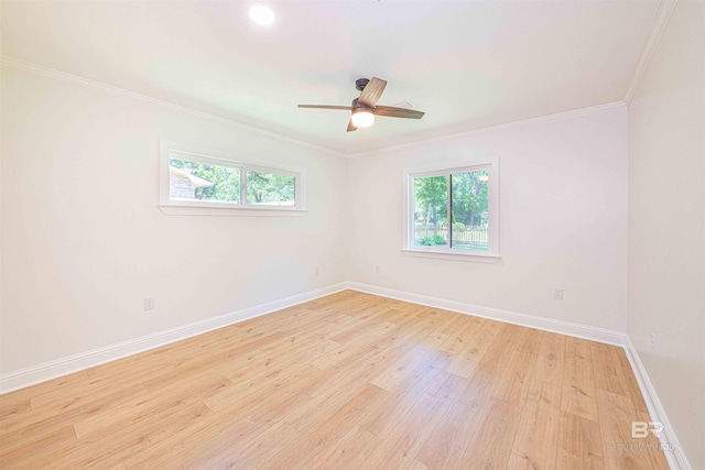 362 Azalea St, Fairhope, AL 36532 - spare room featuring crown molding, healthy amount of natural light, light wood-type flooring, baseboards, and a ceiling fan