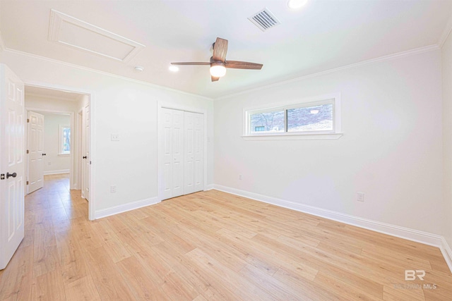 362 Azalea St, Fairhope, AL 36532 - unfurnished bedroom featuring attic access, ornamental molding, baseboards, and light wood-type flooring