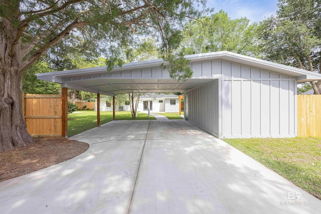 362 Azalea St, Fairhope, AL 36532 - view of parking featuring driveway and a carport