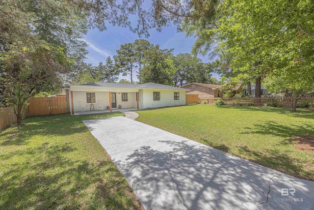 362 Azalea St, Fairhope, AL 36532 - ranch-style home with driveway, a patio area, and stucco siding