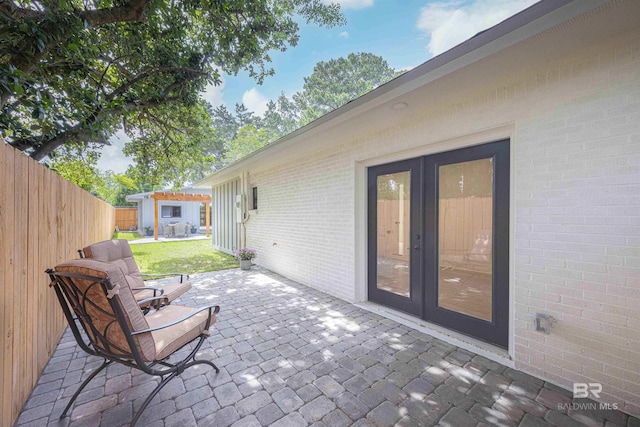 362 Azalea St, Fairhope, AL 36532 - view of patio with french doors and fence