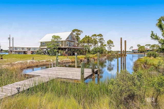 dock area with a water view