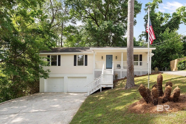 single story home featuring stairs, an attached garage, a front lawn, covered porch, and driveway