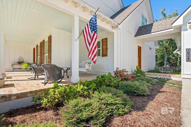 view of side of home with a patio area