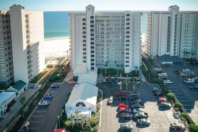 aerial view featuring a water view and a view of the beach