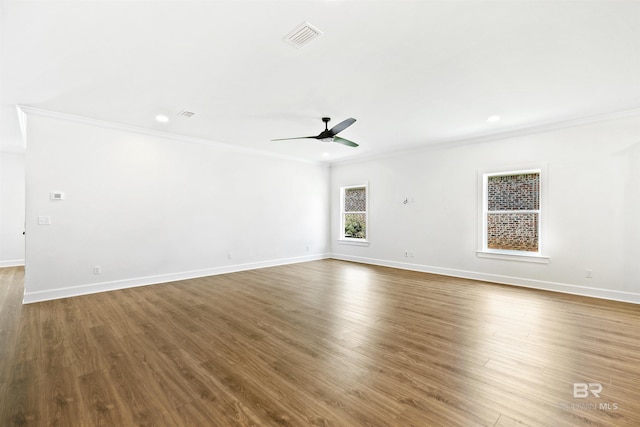 unfurnished room featuring ceiling fan, crown molding, and hardwood / wood-style flooring