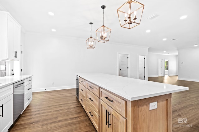 kitchen with stainless steel dishwasher, white cabinets, hanging light fixtures, and a center island