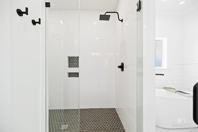 bathroom with an enclosed shower