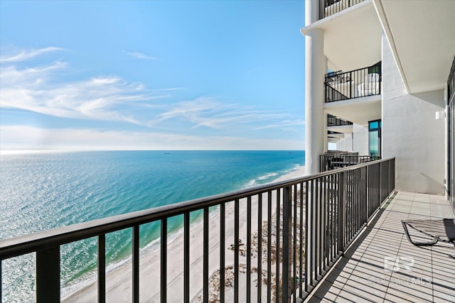 balcony featuring a water view