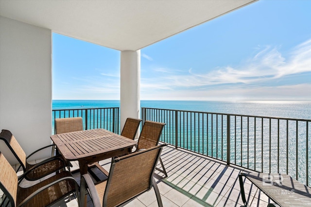 balcony featuring a water view