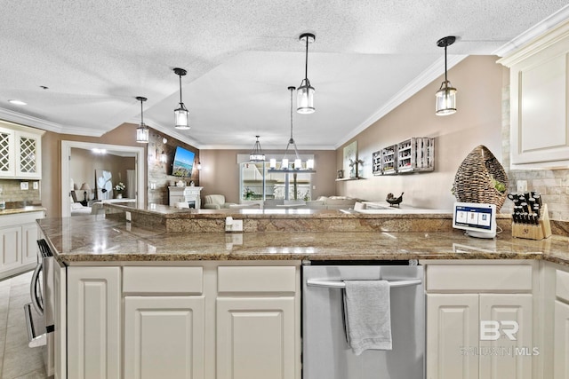 kitchen featuring white cabinetry and crown molding