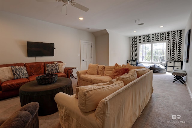 living area featuring ceiling fan, recessed lighting, visible vents, and light carpet