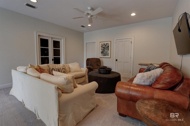 carpeted living room with recessed lighting, visible vents, baseboards, and a ceiling fan