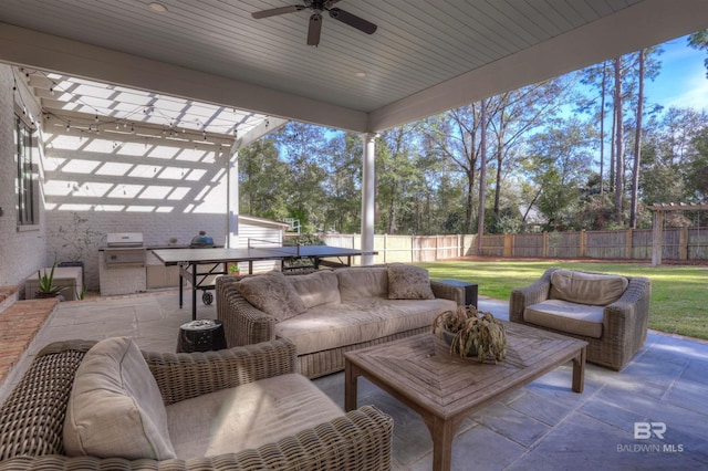 view of patio / terrace with an outdoor living space, outdoor dining area, a fenced backyard, and a ceiling fan