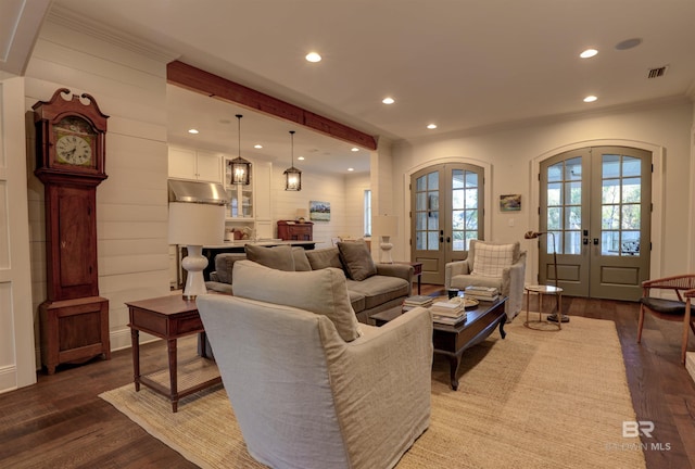 living area featuring recessed lighting, french doors, visible vents, and dark wood-style flooring