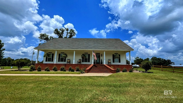 view of front of house featuring a porch and a front yard