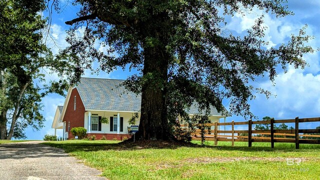 view of front of home with a front yard