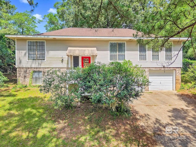 45 Caisson Trce, Spanish Fort, AL 36527 - split foyer home featuring brick siding, driveway, a garage, and a front lawn