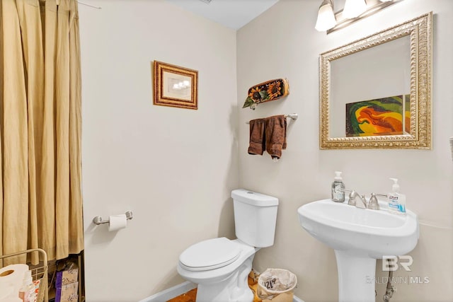 45 Caisson Trce, Spanish Fort, AL 36527 - bathroom featuring toilet and baseboards