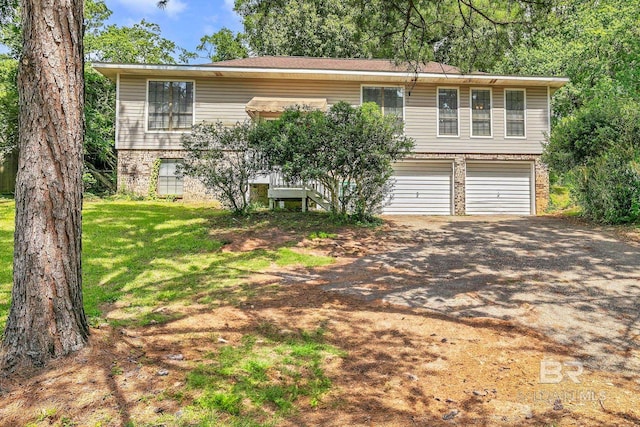45 Caisson Trce, Spanish Fort, AL 36527 - split foyer home featuring dirt driveway, brick siding, a garage, and a front lawn