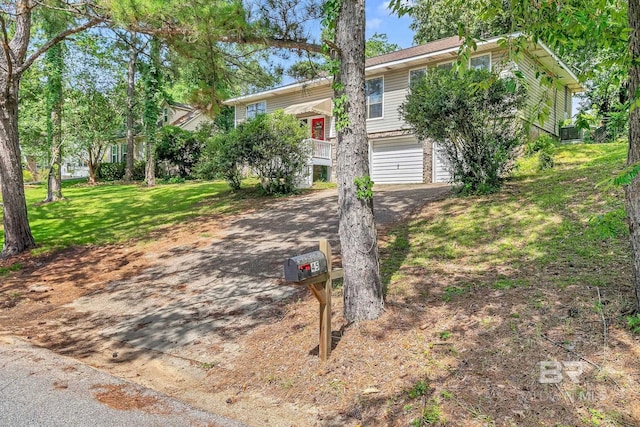 45 Caisson Trce, Spanish Fort, AL 36527 - view of front of home with driveway, a garage, and a front yard