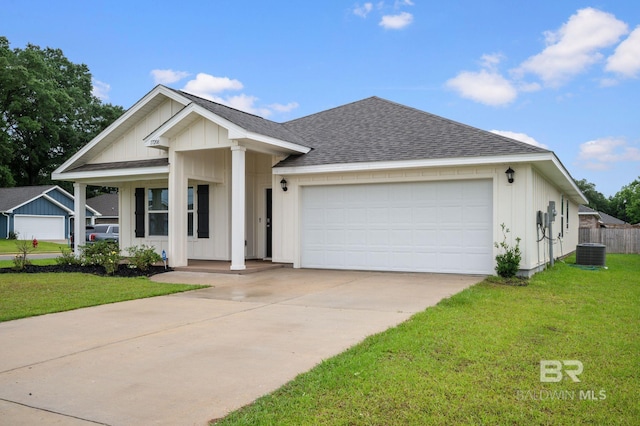 17208 Muse St, Loxley, AL 36551 - view of front of property with roof with shingles, an attached garage, driveway, and board and batten siding