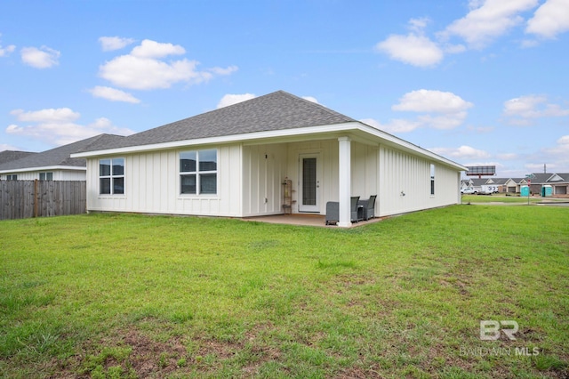 17208 Muse St, Loxley, AL 36551 - back of house with board and batten siding, a patio, and a shingled roof