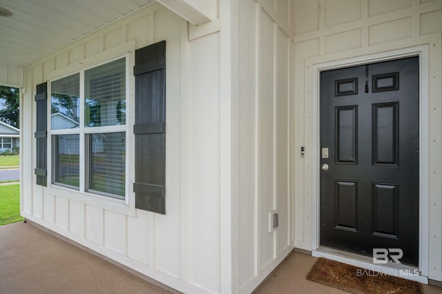 17208 Muse St, Loxley, AL 36551 - entrance to property with covered porch and board and batten siding