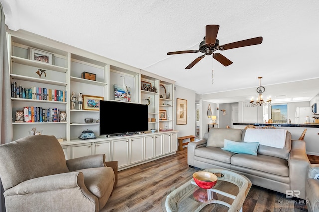 28783 Perdido Beach Blvd Unit 512N, Orange Beach, AL 36561 - living room with a ceiling fan, a chandelier, and wood finished floors