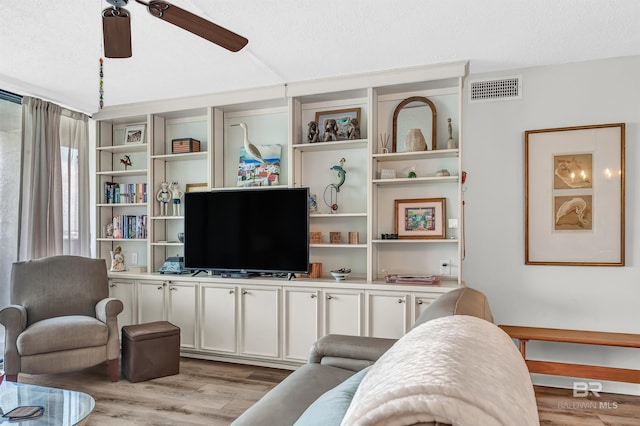 28783 Perdido Beach Blvd Unit 512N, Orange Beach, AL 36561 - living room with light wood-style floors and a ceiling fan